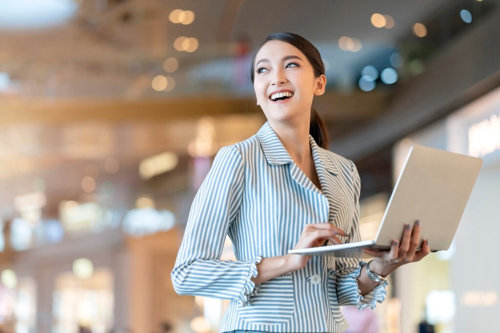 Working lady in a startup company with a confident smile